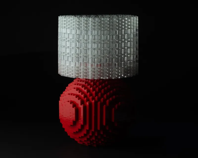 A red Splash of Color lamp with a translucent brick shade on a black studio backdrop.
